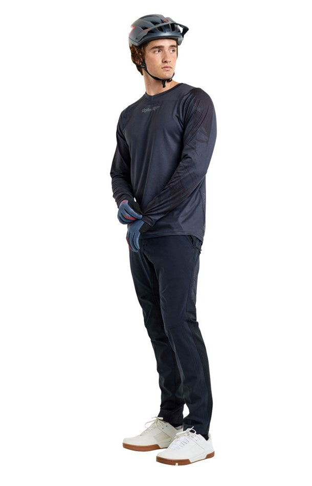 Troy Lee Designs Skyline Chill Pant 25.2 Mono Black SIDE-FRONT FACING MODEL