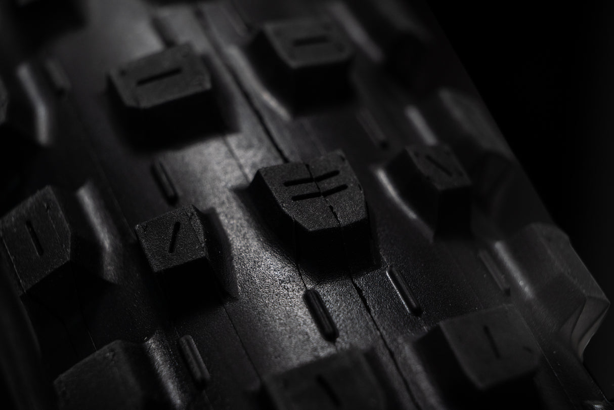 Dissector Gen 2 Tread macro closeup on black background