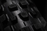 Dissector Gen 2 Tread macro closeup on black background