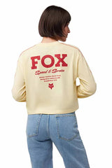 Fox Women's Speed & Service Long Sleeve Crop Top Pale Yellow BACK FACING MODEL