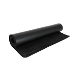 Therabody black yoga mat partially unrolled
