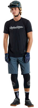 Troy Lee Designs SKYLINE SHORT SLEEVE RIDE TEE SIGNATURE BLACK FRONT FACING MODEL